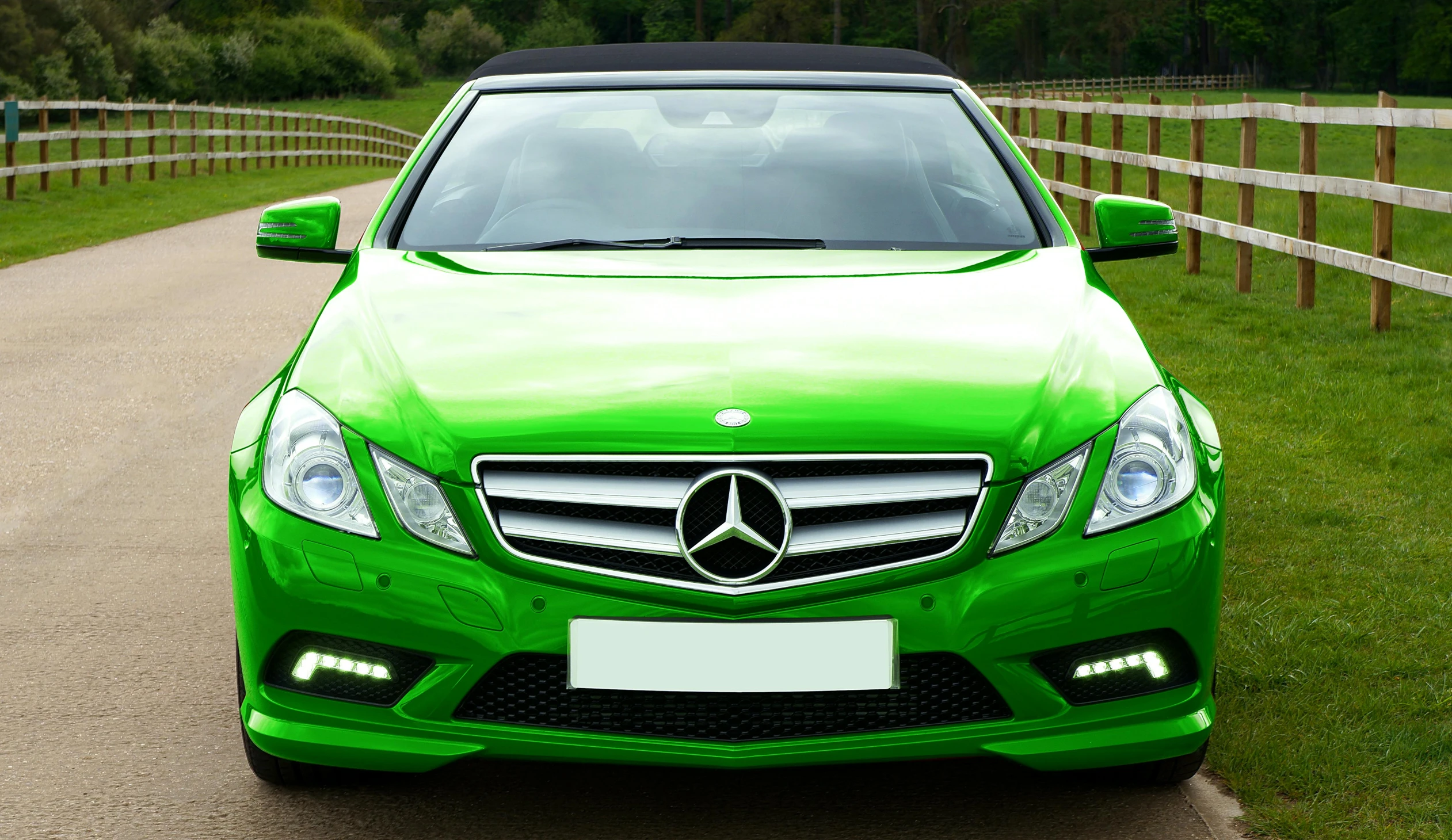 the mercedes cla is painted bright green