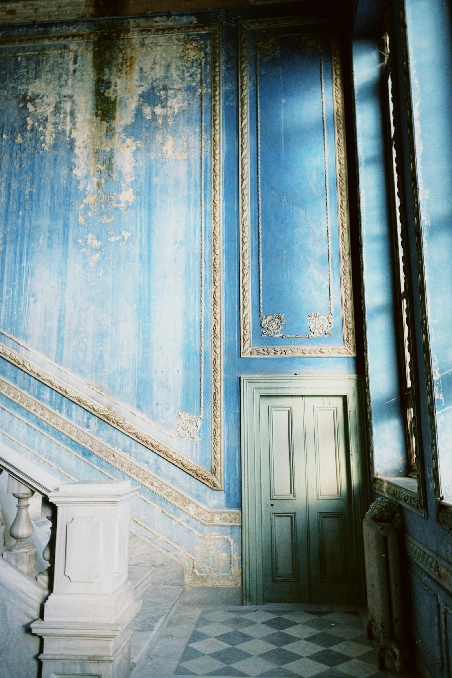 an old style room painted in blue and gold