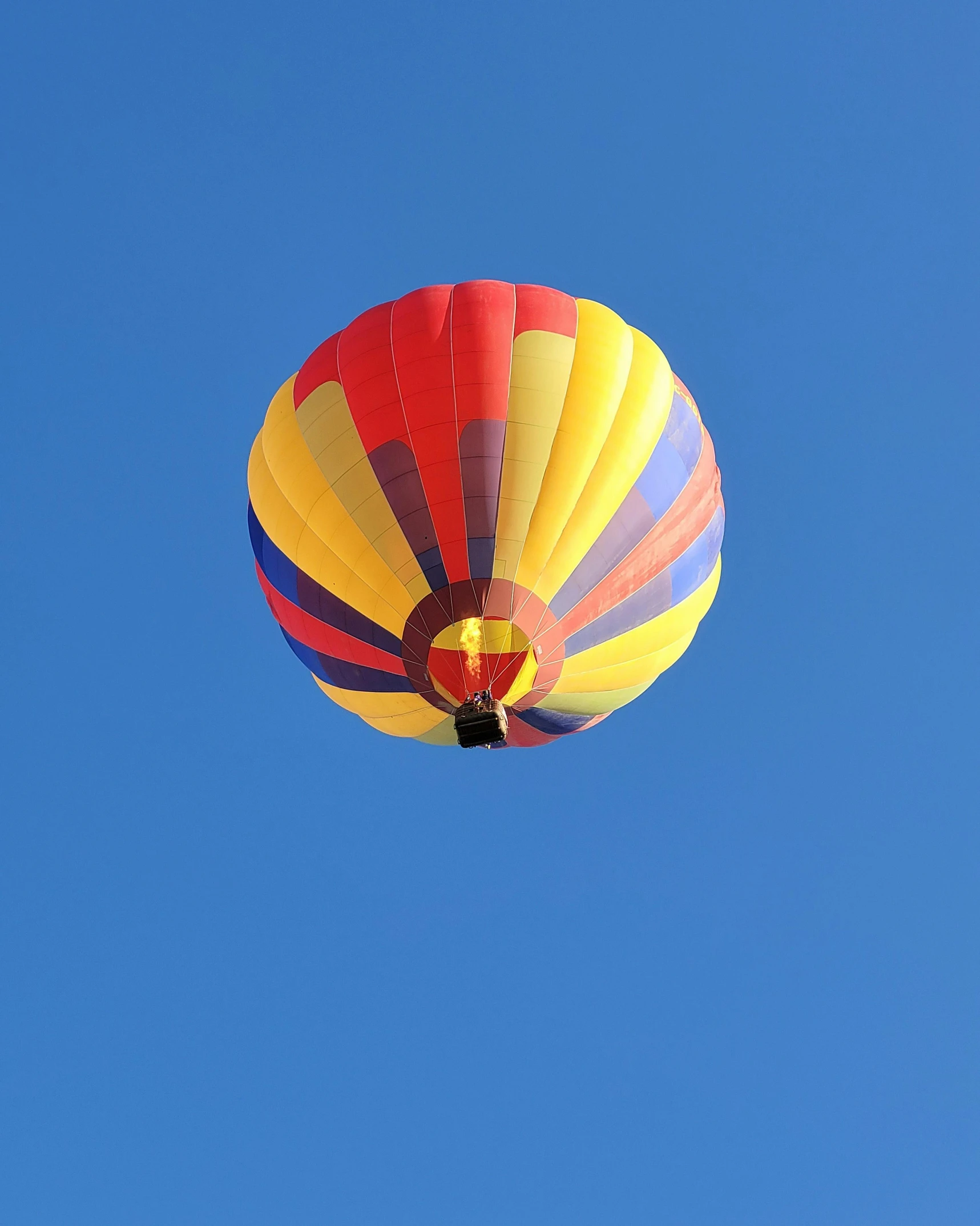 a colorful  air balloon high in the sky