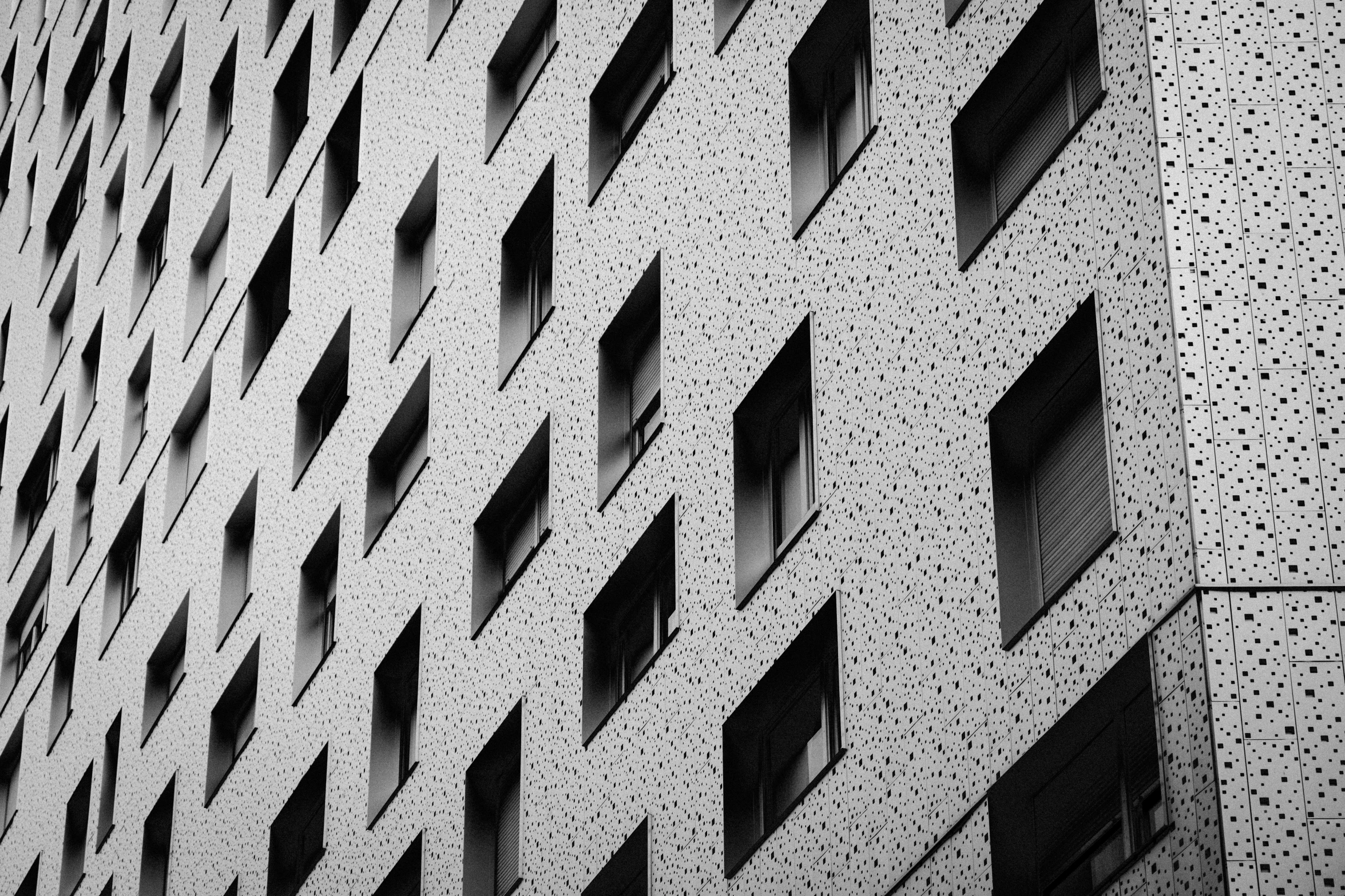 a building has lots of windows and a sign in it