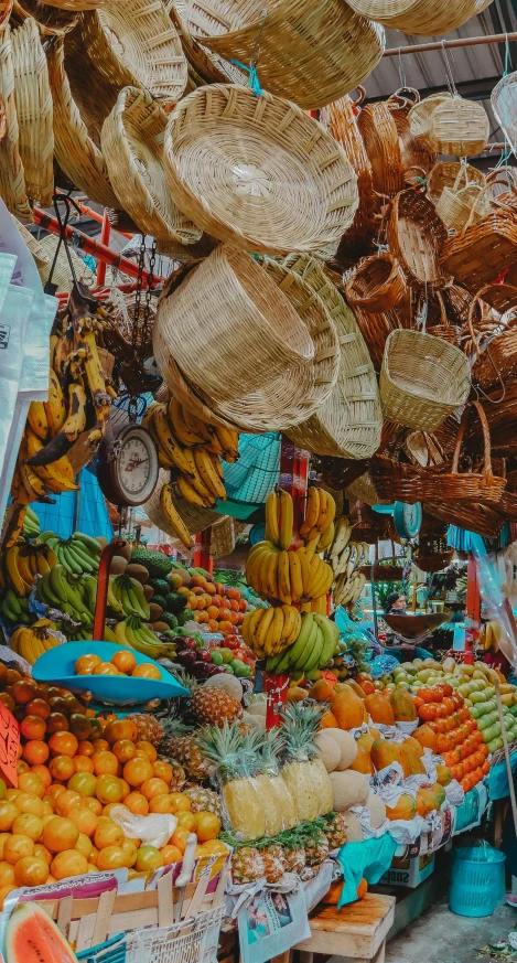 a fruit and vegetable market with lots of fresh fruits