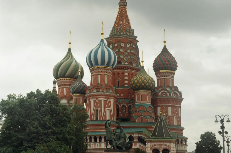 the building has three domes on it and two spires