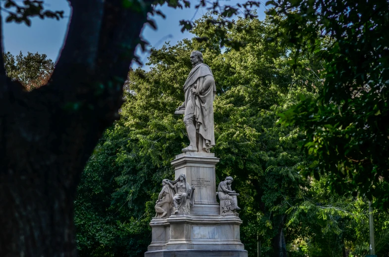 an image of a statue that is in the middle of the street