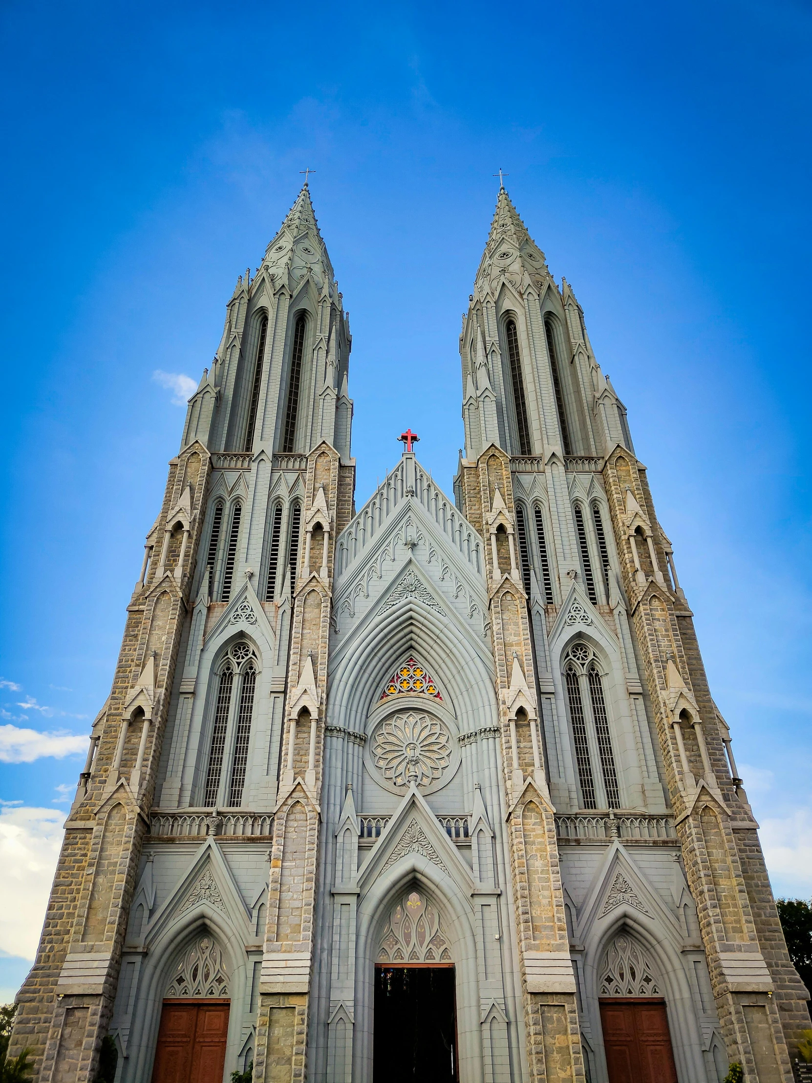 a big building with two towers and the front entrance