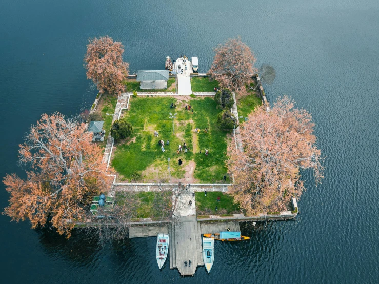 an aerial s of a small island on the water