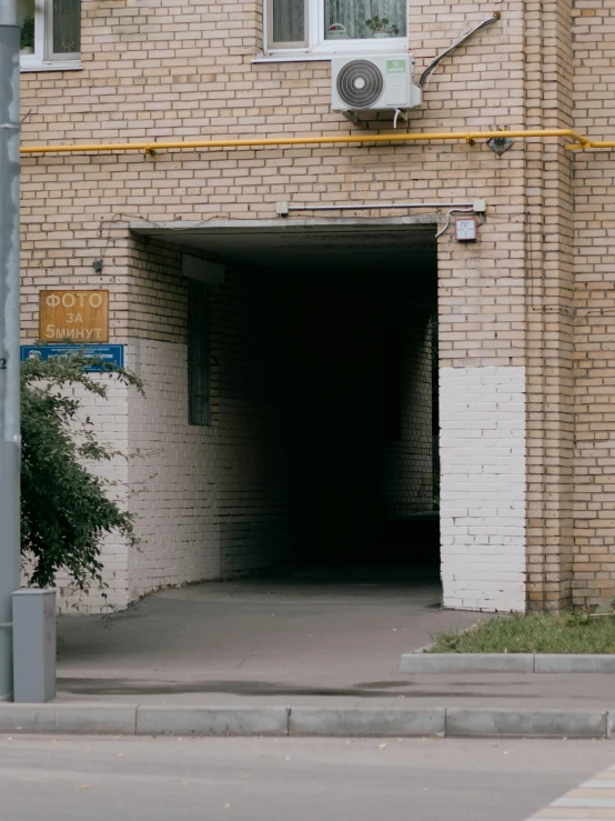 a sign for the entrance of a parking garage