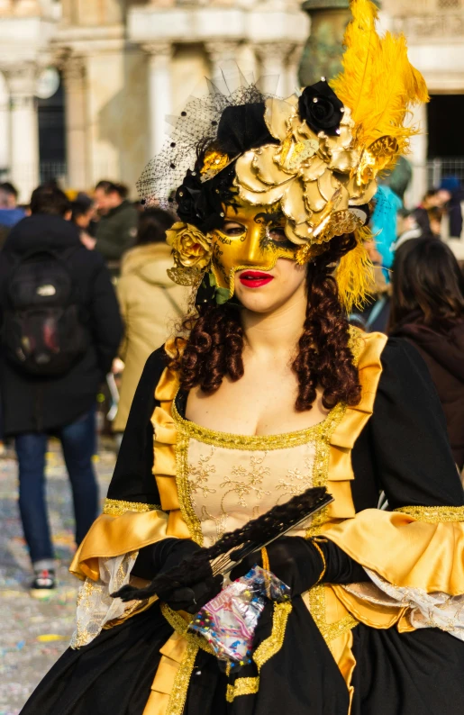 a woman wearing a yellow and black costume