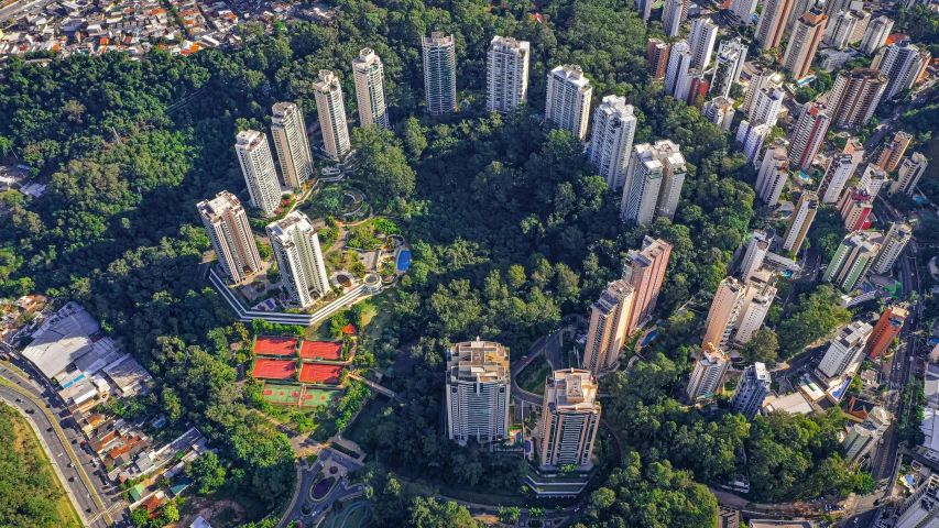 an aerial view of a city skyline with lots of tall buildings