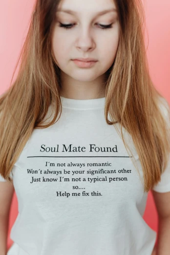 a  with a white t - shirt that says soul mate found