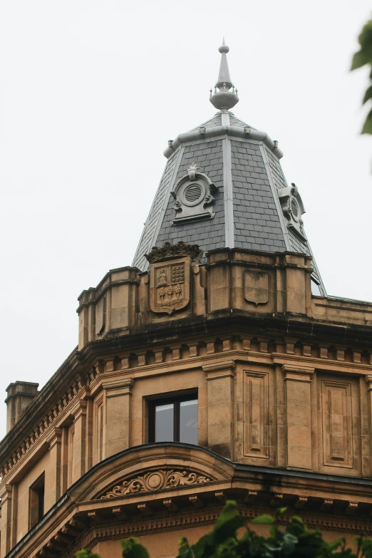 a tall tower with a clock on the top of it