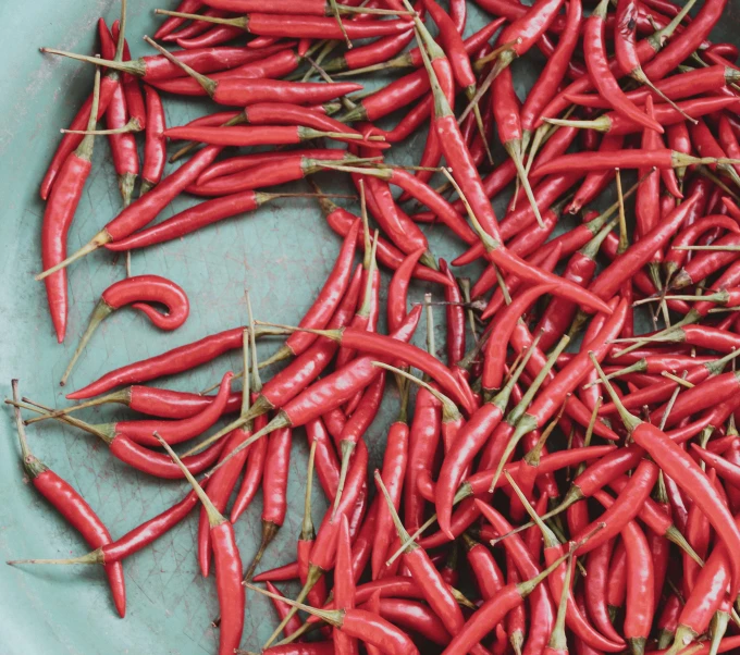 an image of red chilis on the table