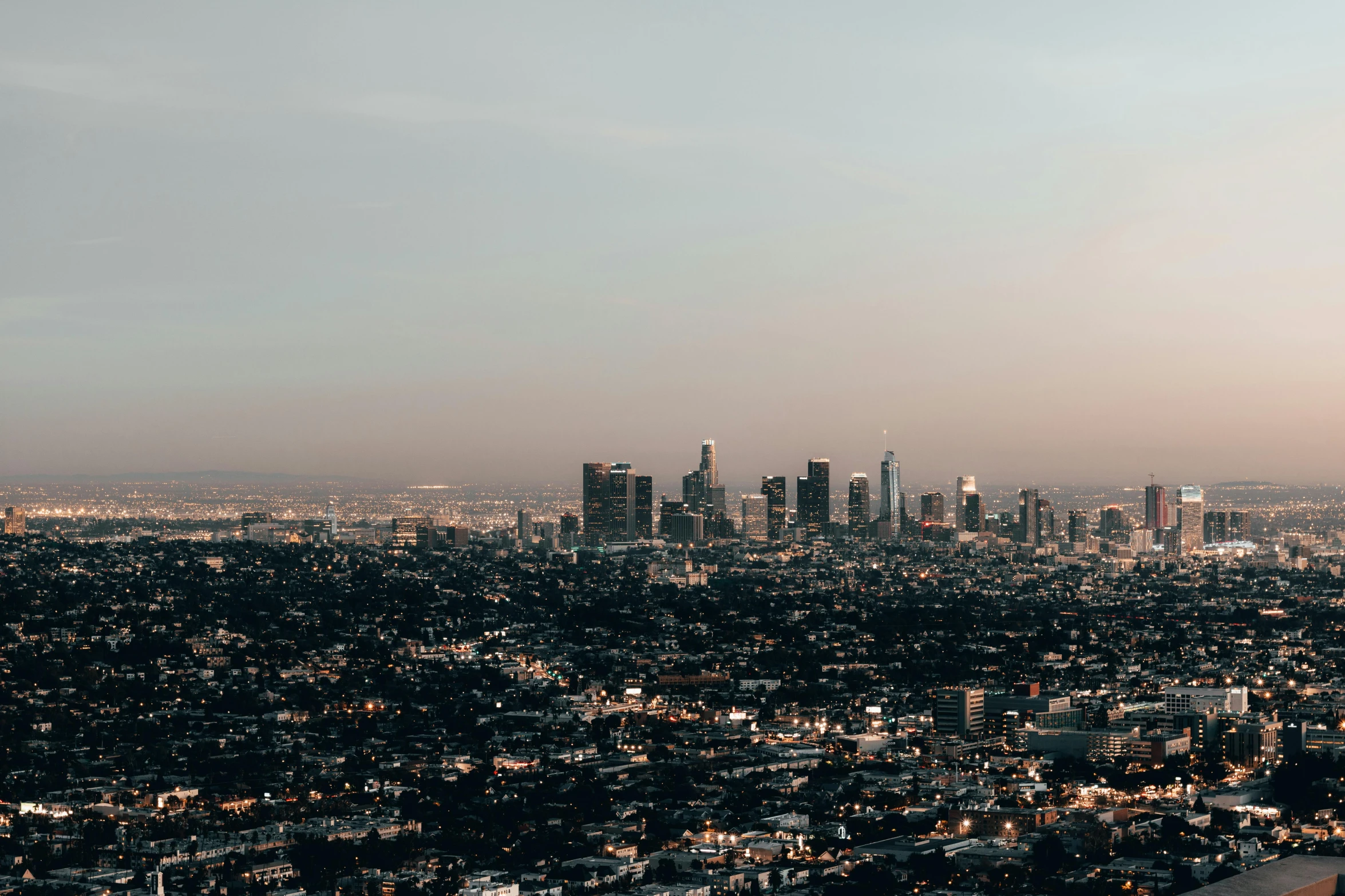 a picture from a tall building with a lot of buildings and lights