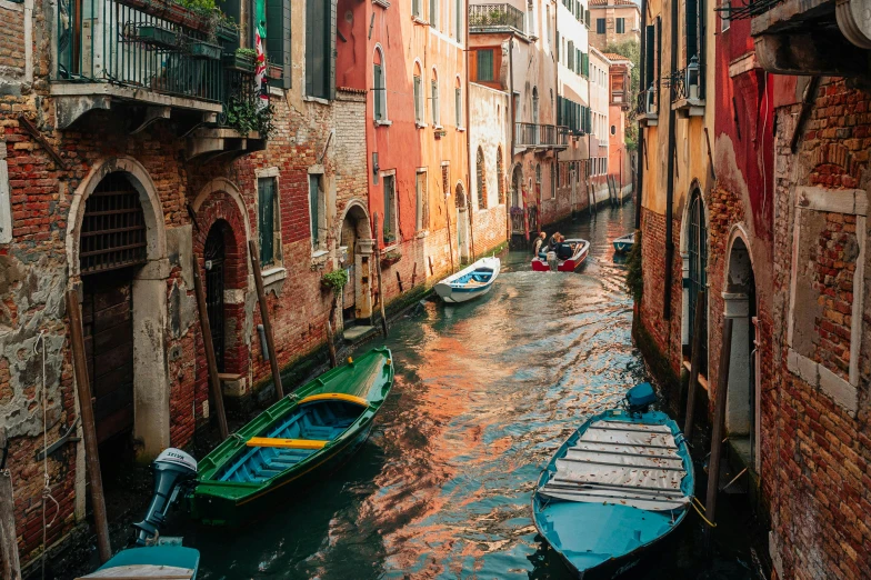 the buildings along this canal have balconies on them