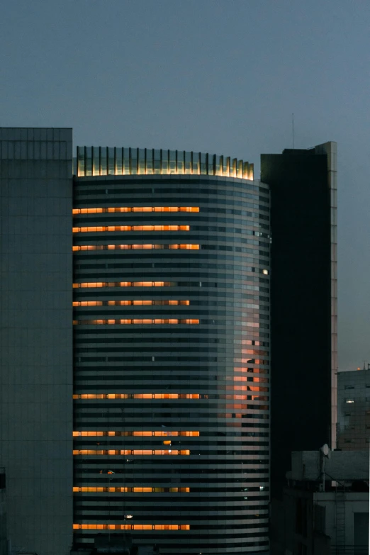 a tall building that is lit up at night