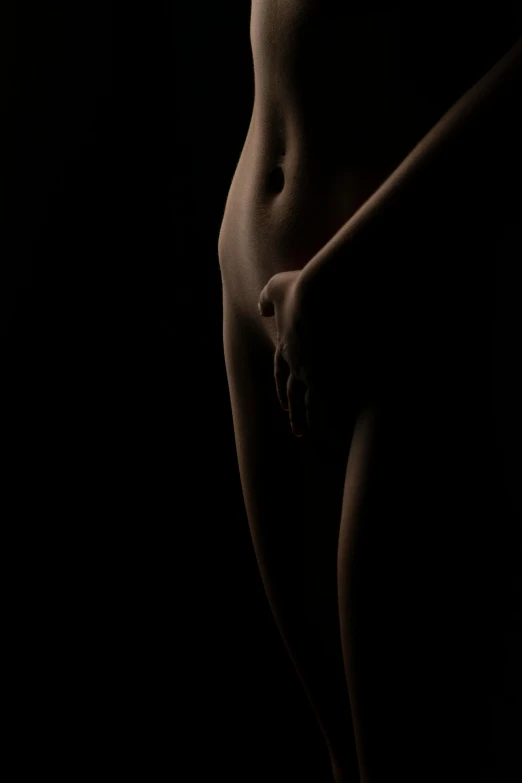 black background picture of  woman with bare 