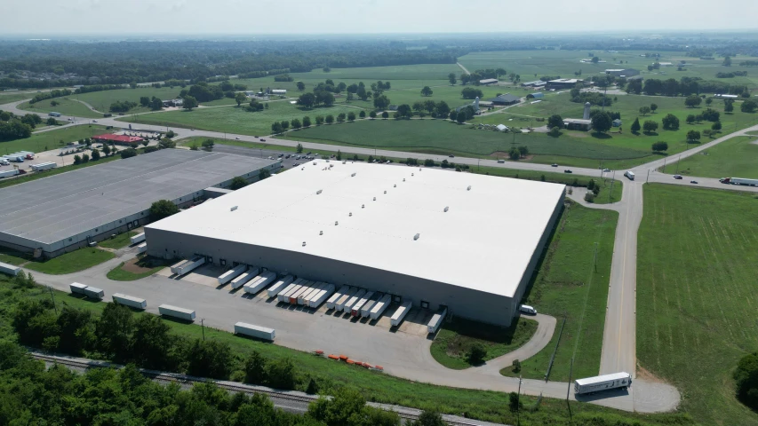 a large building in the middle of an empty lot