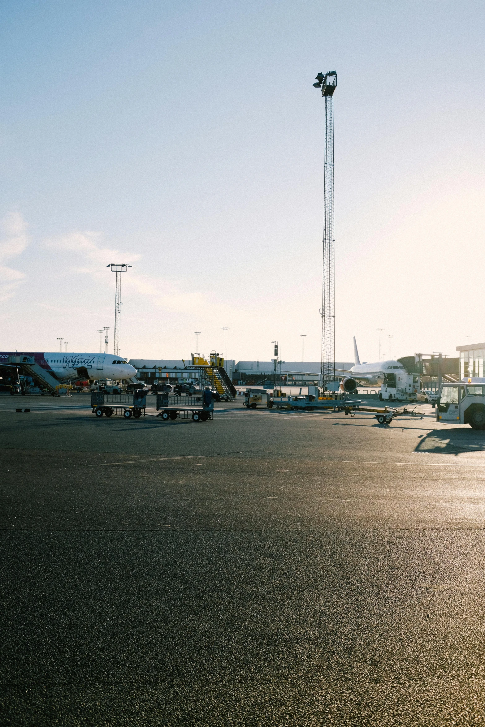 an airport has several large equipment including a crane