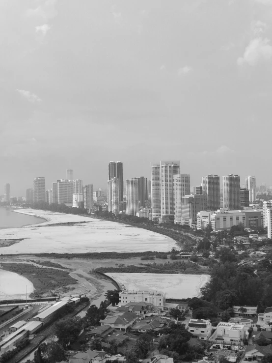 a black and white po shows a city from above