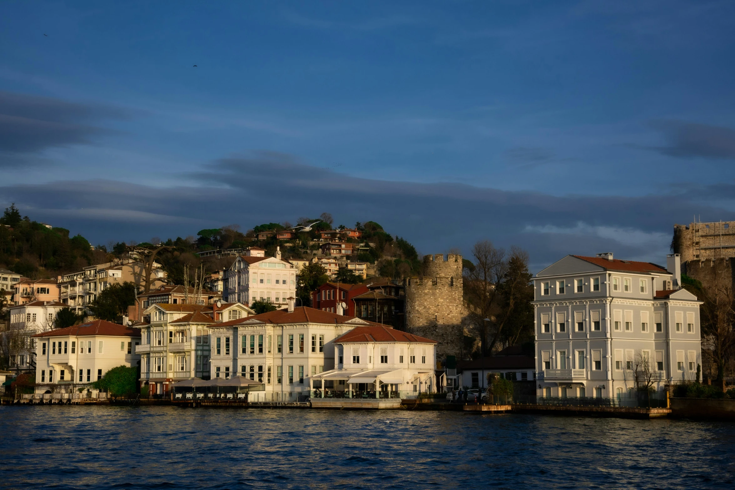 a very big pretty town by the water