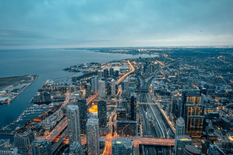 a view of the city is lit up at night