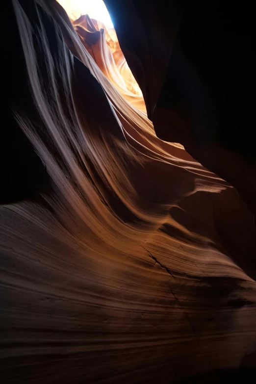 the sky and light show through the large rock formations