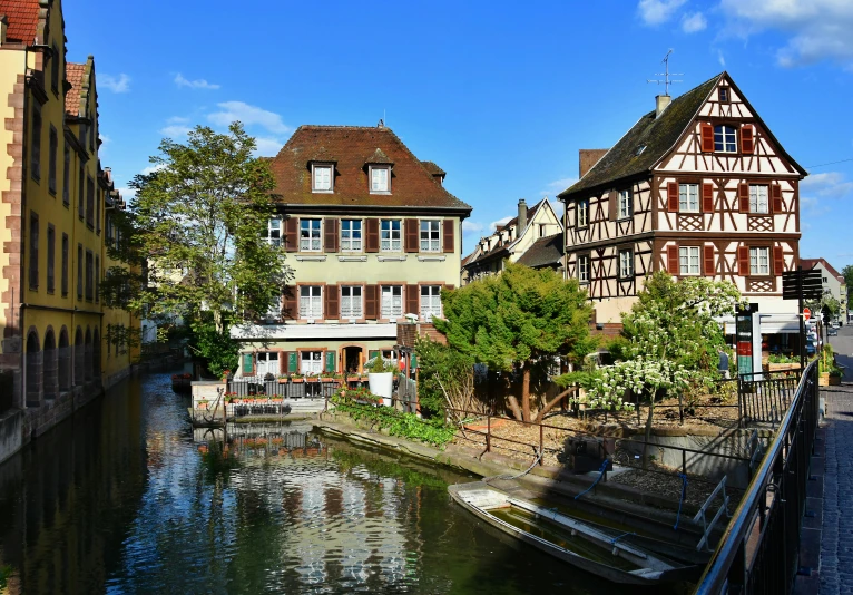 a river running through a town surrounded by tall buildings