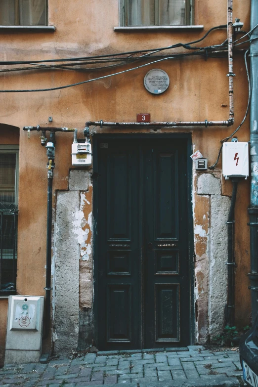 the building has two black doors to it