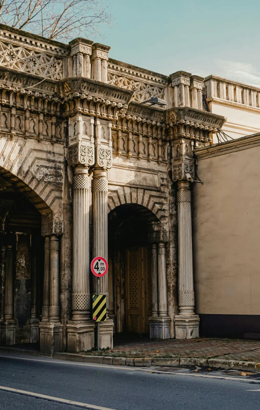 this old building has a very decorative archway on the front