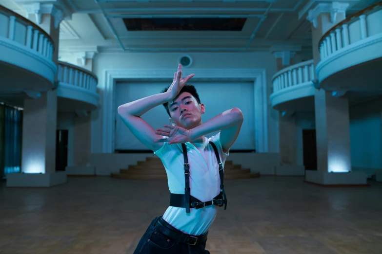 the woman is stretching for a performance at the dance