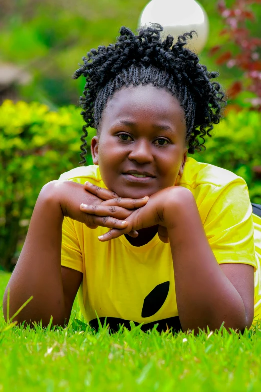 a young person with an object in her hand