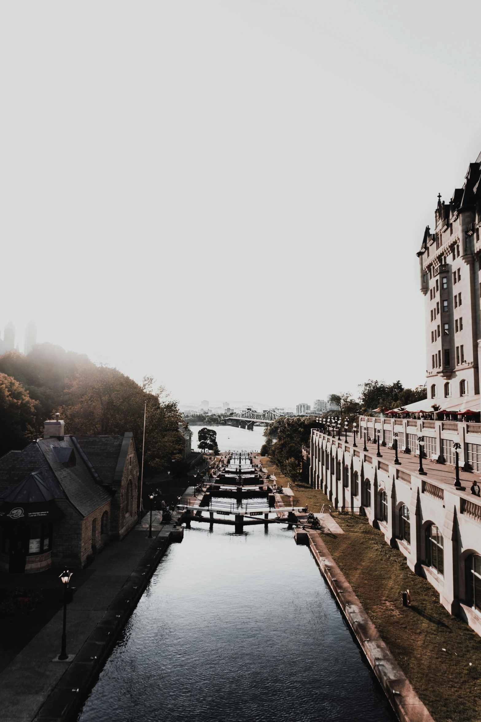 a waterway and buildings along the banks of a large body of water