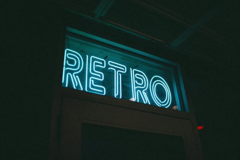 neon signage reading retro lit up at night
