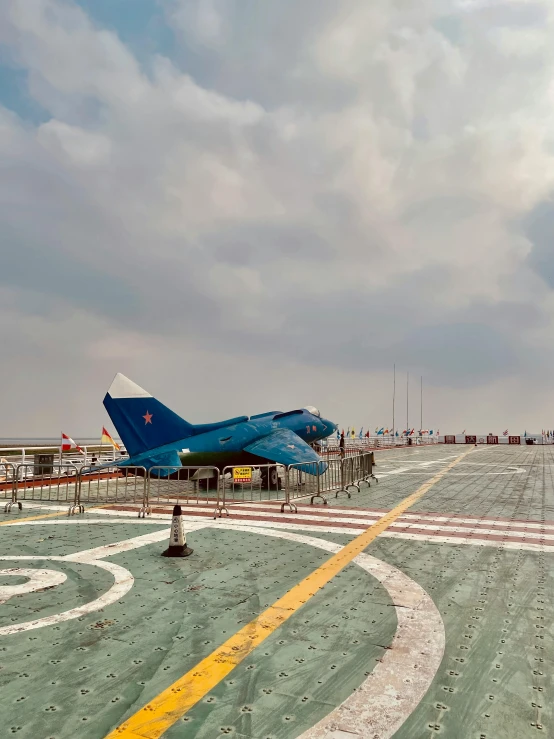 the plane is parked on a tarmac for unloading