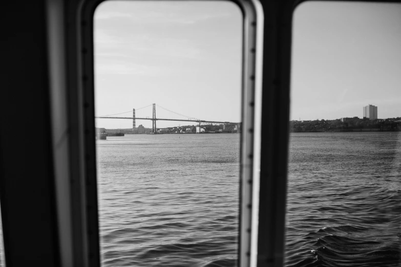 a view of a bay and the bridge over water