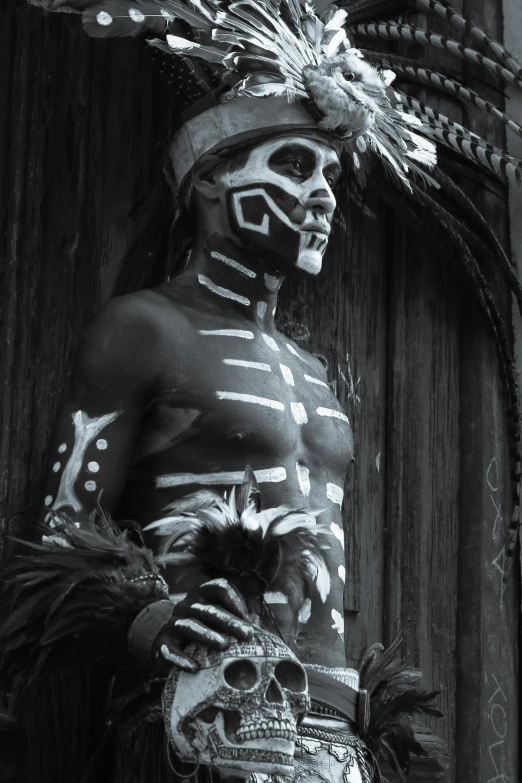 a person in skeleton makeup with a large mask