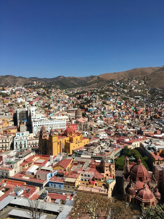 an aerial view of a city with lots of tall buildings