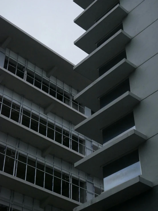 a tall building with two windows on top