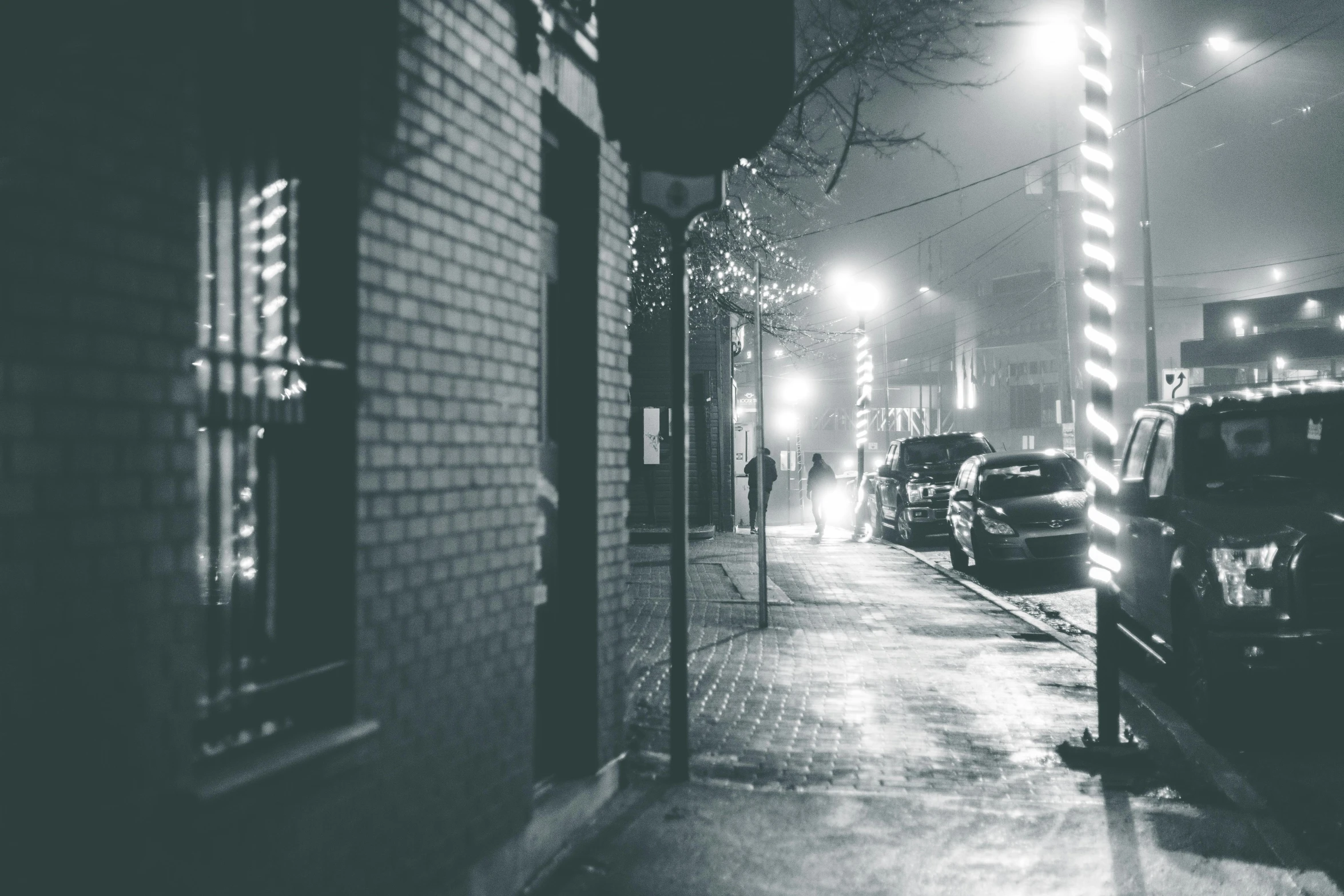 cars are lined up on a city street