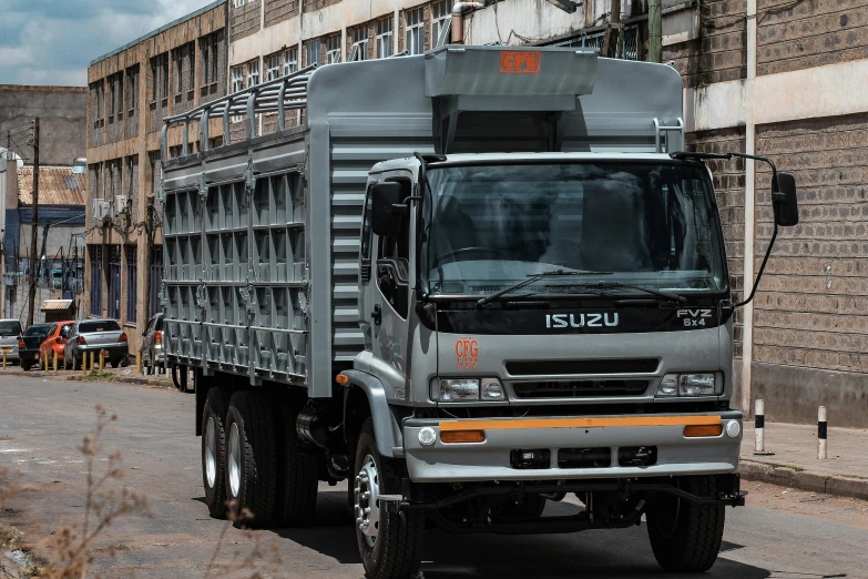 a truck that is sitting on the side of a street