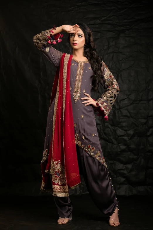 a women's wear from india poses for a po