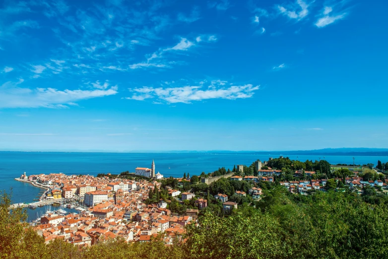 a very beautiful view of the ocean and a village