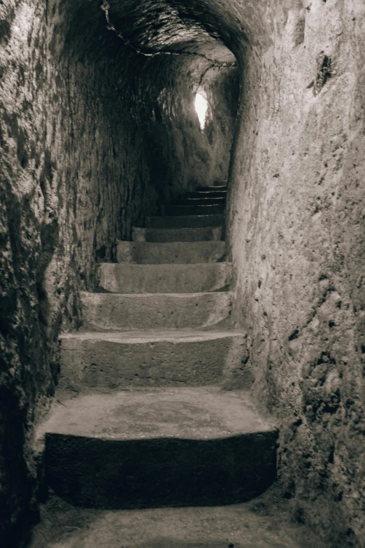 there is a staircase leading up to the light that illuminates it