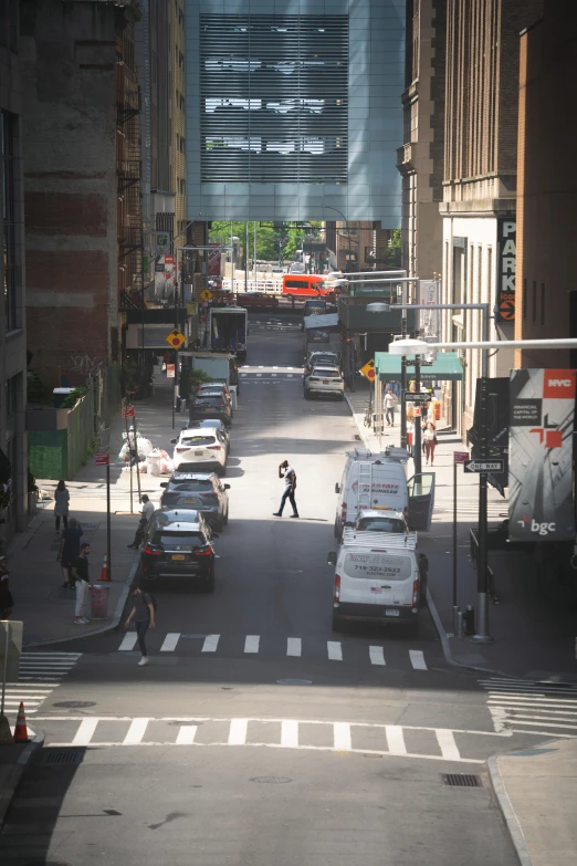 people walk around on the road in the city