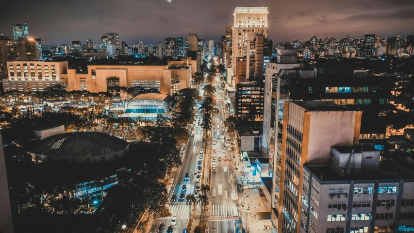 an overhead view of city buildings at night