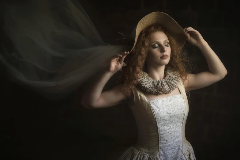 a beautiful red headed woman in a dress with a hat