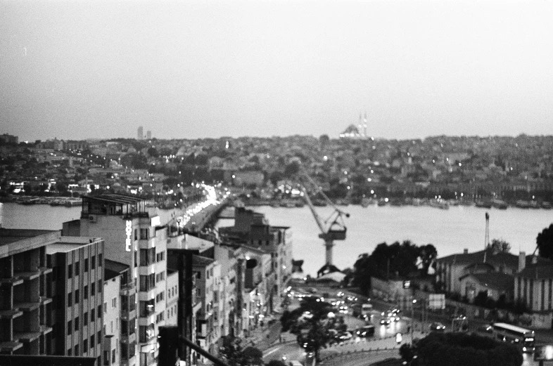 black and white image of the city skyline at night