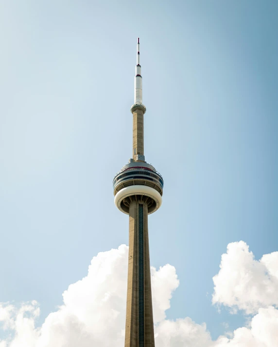 a very tall tower with a sky background