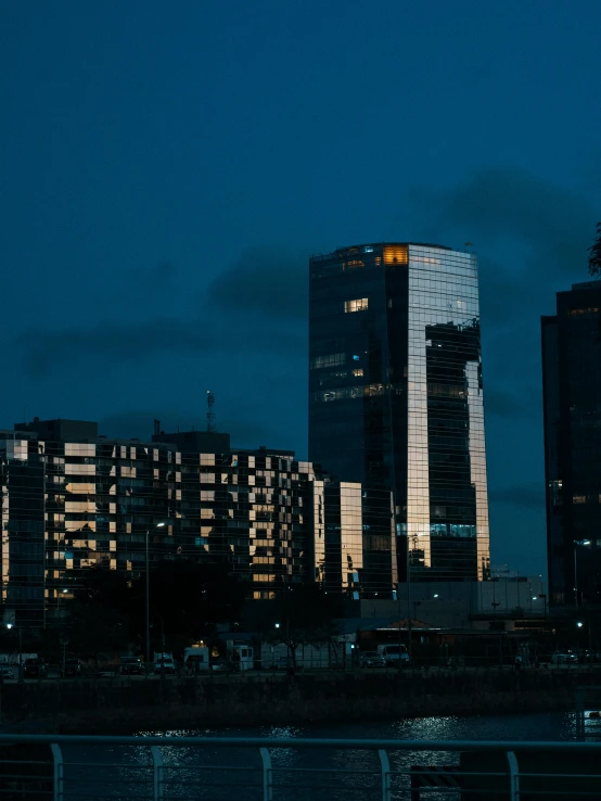 this is the skyline and skylines of two buildings at night