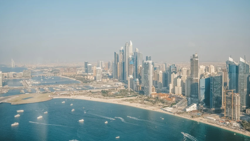 an aerial view of a large city and beach