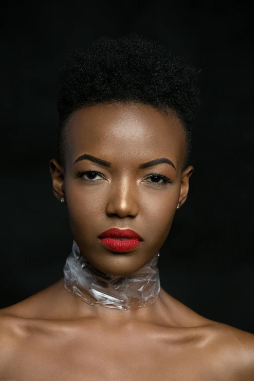 a young woman is wearing a white plastic collar